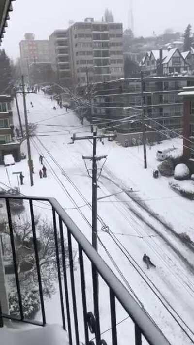 Sleds, snowboards, and even a kayak on the Queen Anne hill.