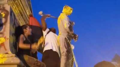 Protestors tearing down Confederate statues in Portsmouth, VA.