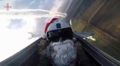 Ukrainian jet pilot in Santa costume firing missiles at Russian targets