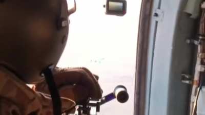 Ukrainian soldier shoots down Russian Shahed-136 with machine gun fire from a Mi-8 helicopter