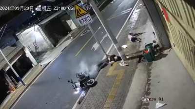 2 girls on a motorcycle hit a pole