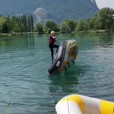 Flipping an overturned raft without getting wet