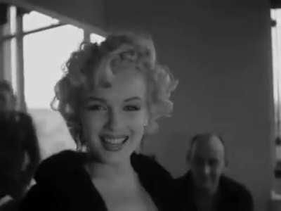 Lucky soldier gets some special treatment from Marilyn Monroe during her visit to the army hospital in Tokyo Japan (1954)