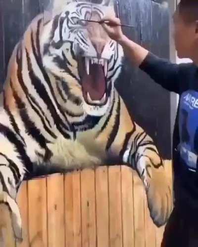 Drawing a tiger on a random wooden gate.