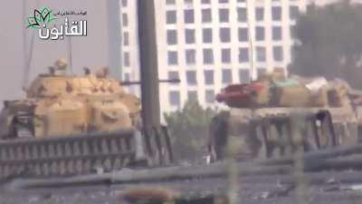 Syrian Army BMP-2s lay down fire while running the gauntlet on a contested road in Qaboun, Damascus - 6/24/2013