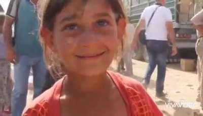 Little orphaned girl in war torn Iraq. This made me suffer