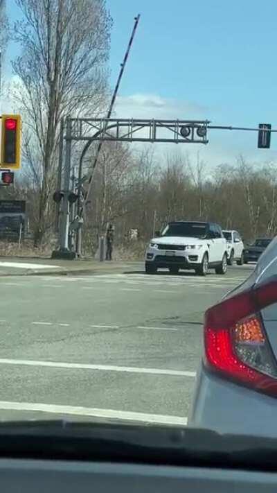 Lights at shell and alderbridge wouldn’t change because the railroad divider was stuck. Thank you stranger!