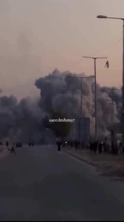 Airstrike on a building in Deir al Balah, Gaza after a roof knock, filmed by three people