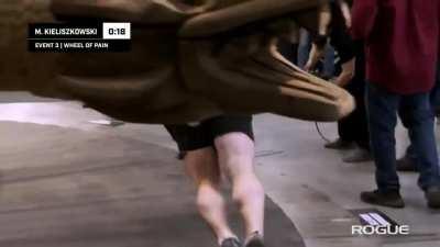 Mateusz Kieliszkowski wins at Conan's Wheel of Pain (The whole thing weighs 9000 kg/20000 lbs)