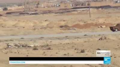 Western Special Forces embedded with Kurdish troops destroy a speeding ISIS suicide bomb with a Javelin Missile near Shaddadi, Syria (February 2016)