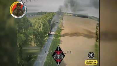 Ukrainian kamikaze drone destroys a Russian KamAZ-4350 when a soldier peeks out the hatch. Kursk Oblast. August 2024