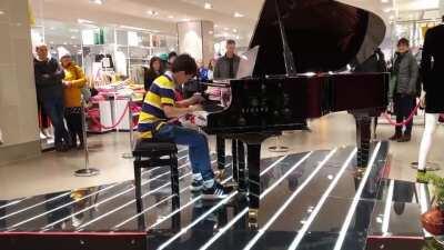 11yo plays Bohemian Rhapsody by Queen on a store piano!