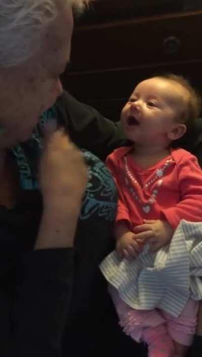 Deaf Grandmother teaching 9 weeks old deaf baby sign language