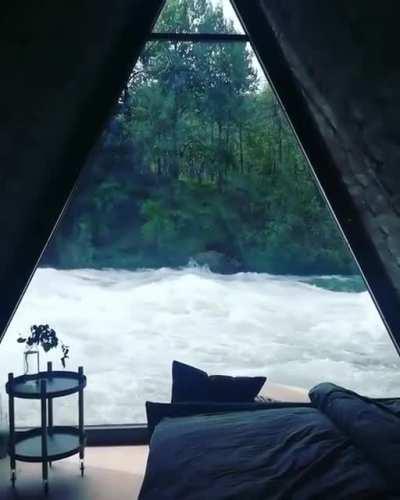 Oddly satisfying cabin by the river (crosspost from r/nextfuckinglevel)