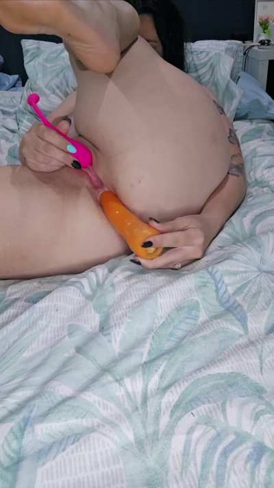 Stretching my ass with a carrot until I cum.