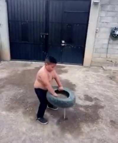 This kid completing backyard obstacle course.