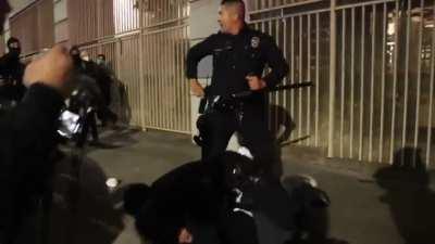 Police tried to arrest and protester in LA last night...but the people didn't allow it.