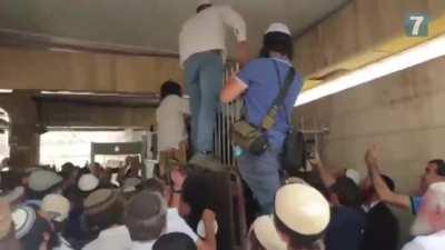 Jewish Extermists Forcing the Doors of the Masjid Al Aqsa