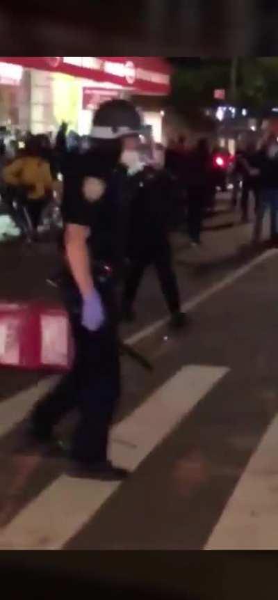 NYPD pulls a gun on protestors, doesn’t fire.