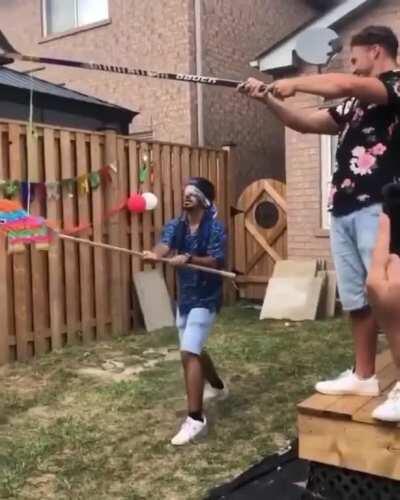 WCGW trying to hit a pinata while blind folded