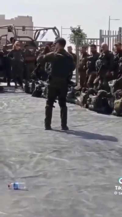 Redneck American rallying soldiers to invade Gaza. Which Tarantino film is this?