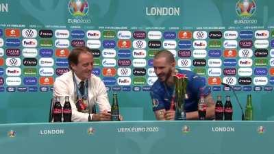 Mancini and Bonucci watching memes during post-match press conference