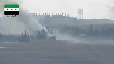 TOW strike against SAA tank in northern Hama countryside, al-Masasnah front (Syria)