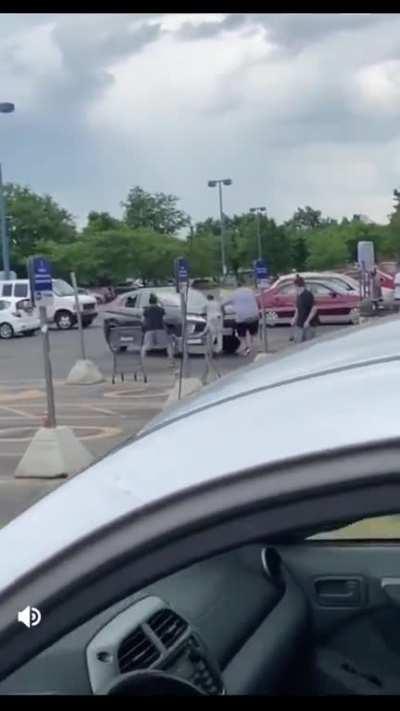 Man smashes car window, instantly regrets it.