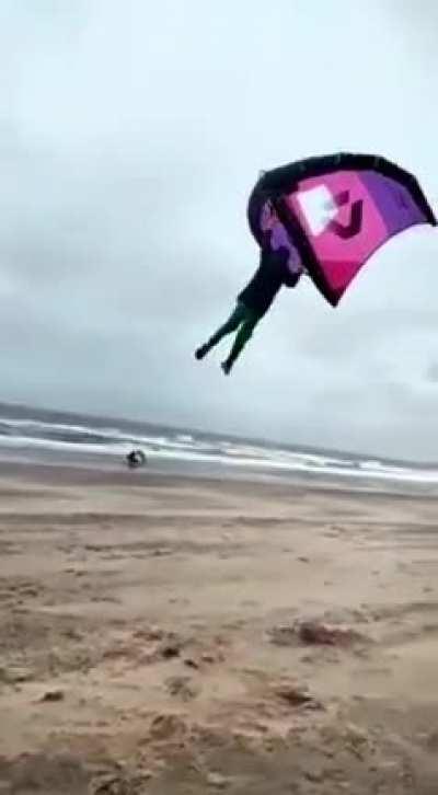 Holding a kite during a storm...