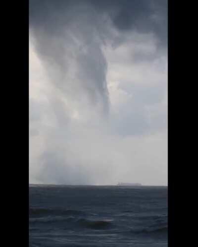 Man Captures Massive Multiple-Vortex Waterspout