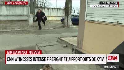 CNN news crew witnesses a firefight near the Antonov Airport in Kiev, Ukraine