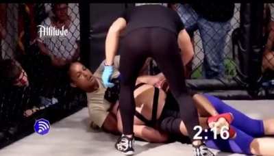 Former NFL cheerleader, Rachel Wray tries MMA. She instantly gets pieced up and put to sleep