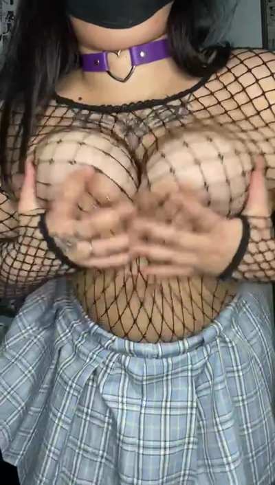 Fishnets with natural goth boobies..