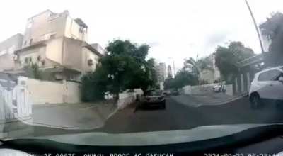 Dashcam footage of a rocket impact in Kiryat Bialik, Israel