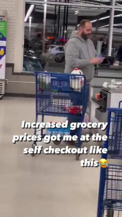 Guy blatantly stealing through self check