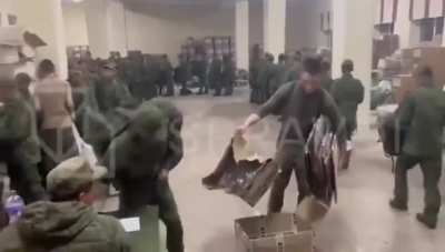 North Korean troops receiving Russian uniforms and equipment before heading to the front lines in Ukraine