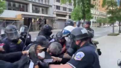 Protesters hand rioter over to police