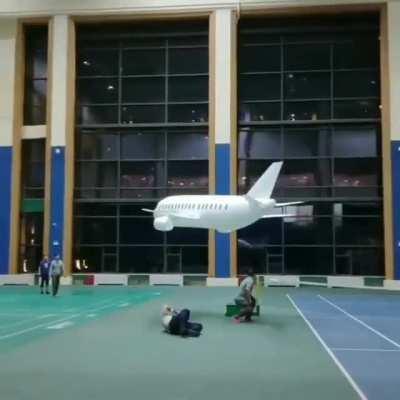 The way this massive inflatable plane flies slowly indoors