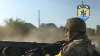 Ukrainians from Azov Battalion return fire on separatists while retreating from Ilovaisk, shortly before the city was entirely surrounded (August 2014)