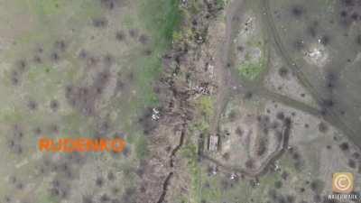 Russian forces targeting Ukrainian position with a grenade inside a cup dropped from a drone