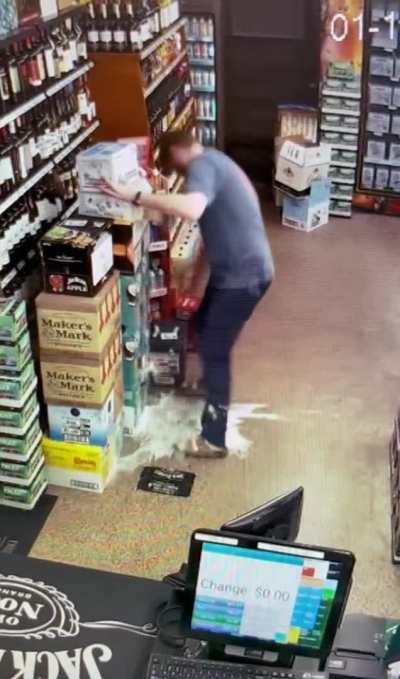 Man tries to grab beer case then realizes it has a hole