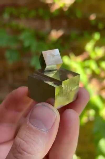 Near perfect cubes of Pyrite from a mine in Navajún, La Rioja, Spain. These natural crystals have not been carved, cut, or polished and are shown just as they came from the earth.