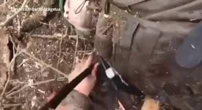 The video is 18+. A Ukrainian combat medic provides first aid to two of his wounded comrades. One of the tourniquets turned out to be a Chinese fake, so two had to be applied.