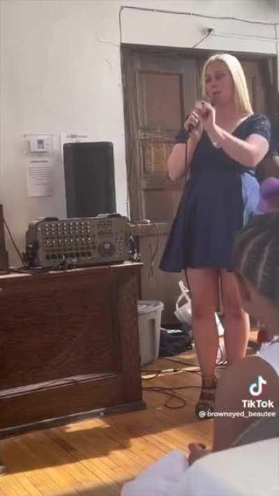 Bride's drunk friend gives wedding speech, assures everyone she's not racist