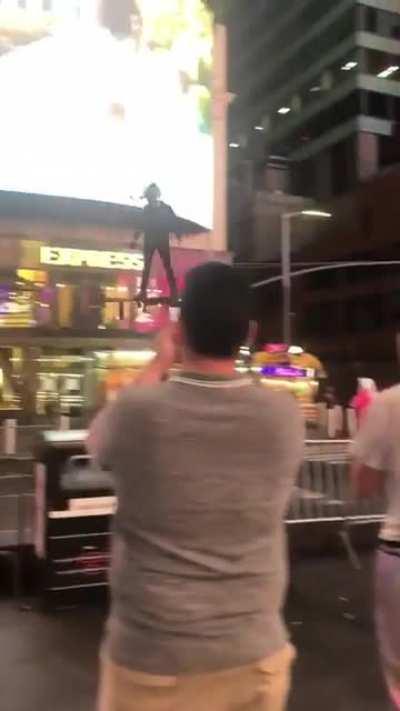 This guy flying thru Times square last night.