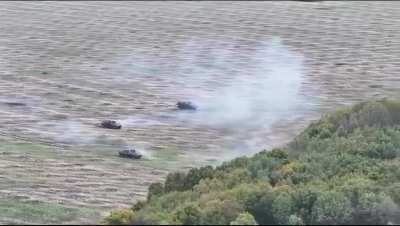 Russian assault by 3 BTR-82's in the Kursk region, infantry are seen ducking down most likely due to return fire. Deceptive cut, October 2024.