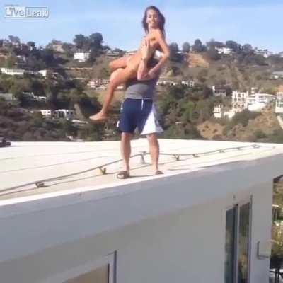 Guy throws woman, narrowly missing pool curb