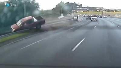 Truck falls off the road during crash