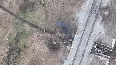 Ukrainian drone hunting down Russian troops hiding under a bridge