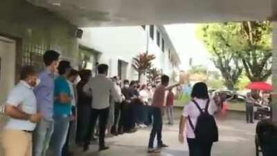 People shouting &quot;Murderer&quot; to a doctor that will abort the baby of a 10y old girl that was raped. Brazil